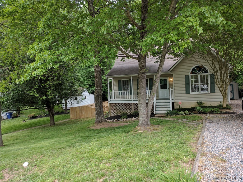 3103 Gregwood Road Midlothian, VA 23112 - Photo 2 of 26 a front view of a house with a yard