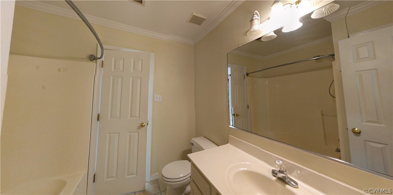 3103 Gregwood Road Midlothian, VA 23112 - Photo 26 of 26 a bathroom with a sink vanity mirror and toilet