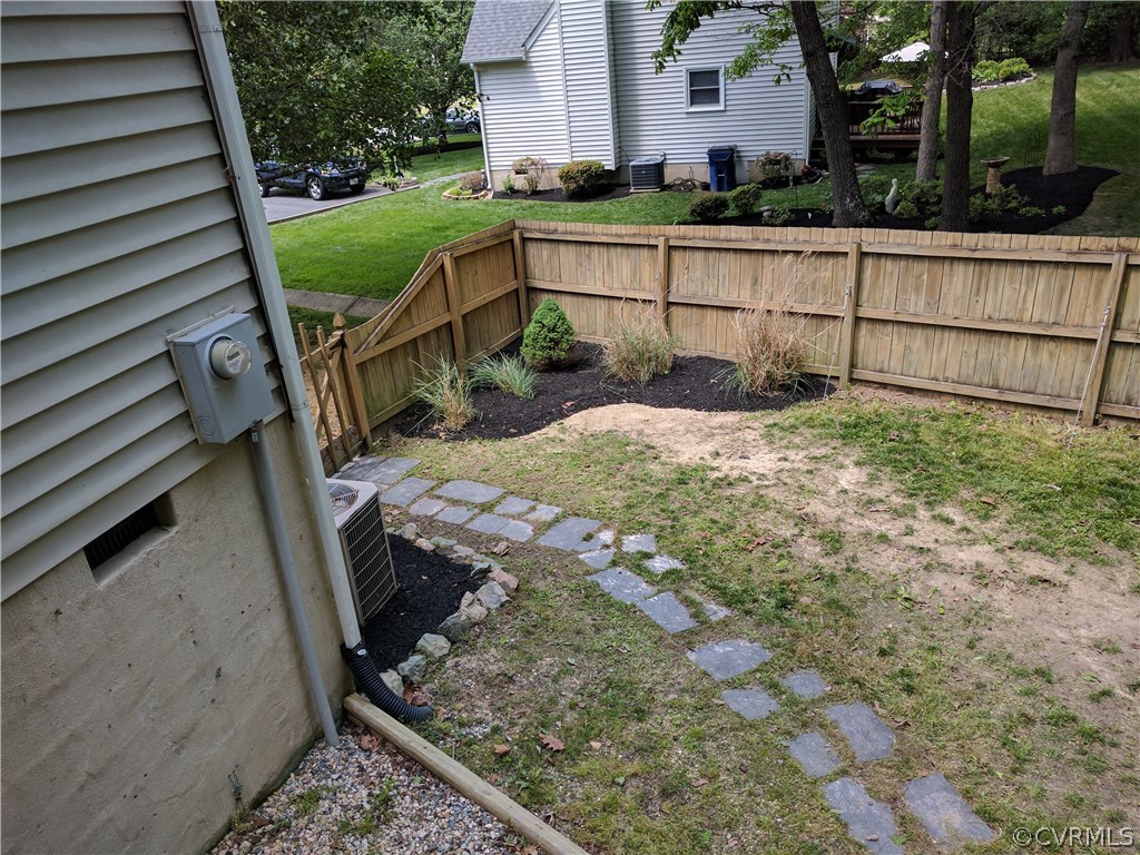 3103 Gregwood Road Midlothian, VA 23112 - Photo 8 of 26 a view of backyard with wooden fence