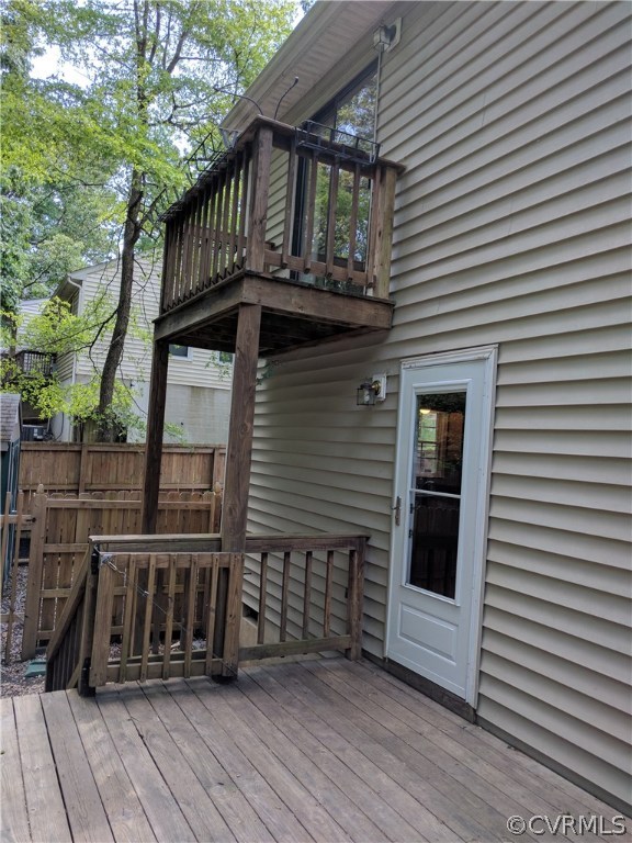 3103 Gregwood Road Midlothian, VA 23112 - Photo 9 of 26 a view of wooden house with a balcony