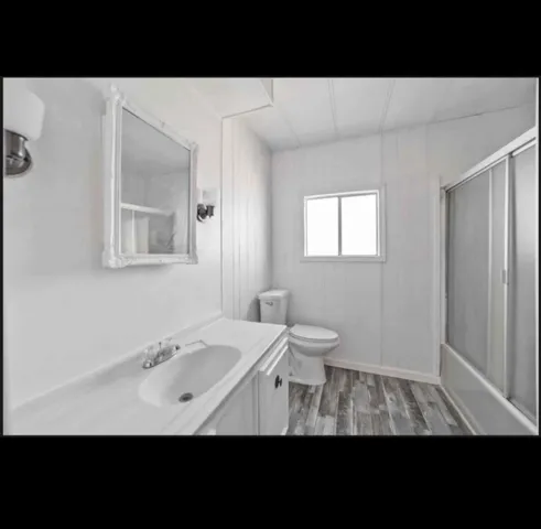 a bathroom with a sink and a toilet