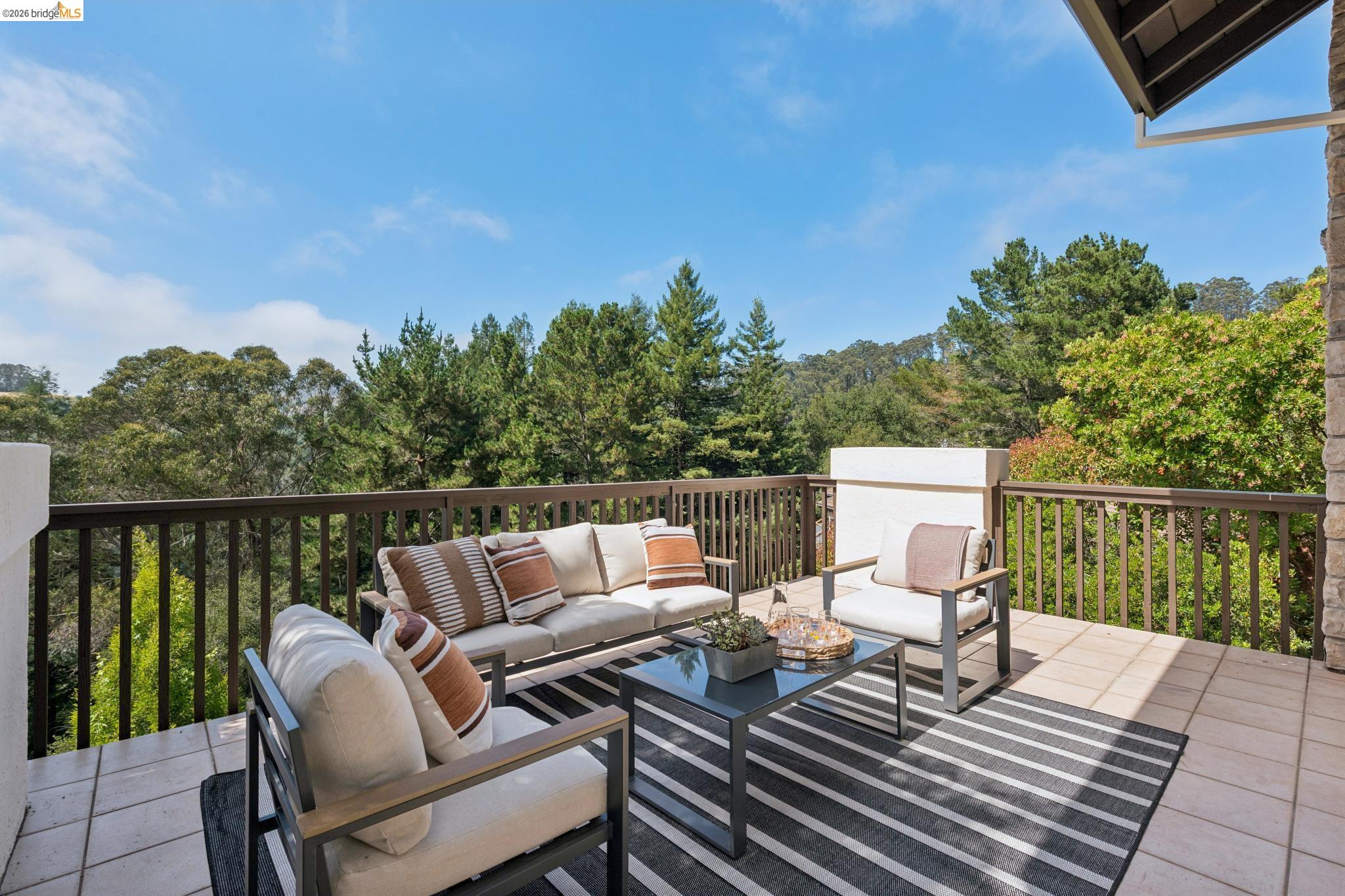 1325 Drury Road Berkeley, CA 94705 - Photo 16 of 71 Expansive outdoor deck featuring tile flooring and durable wood-finish railings