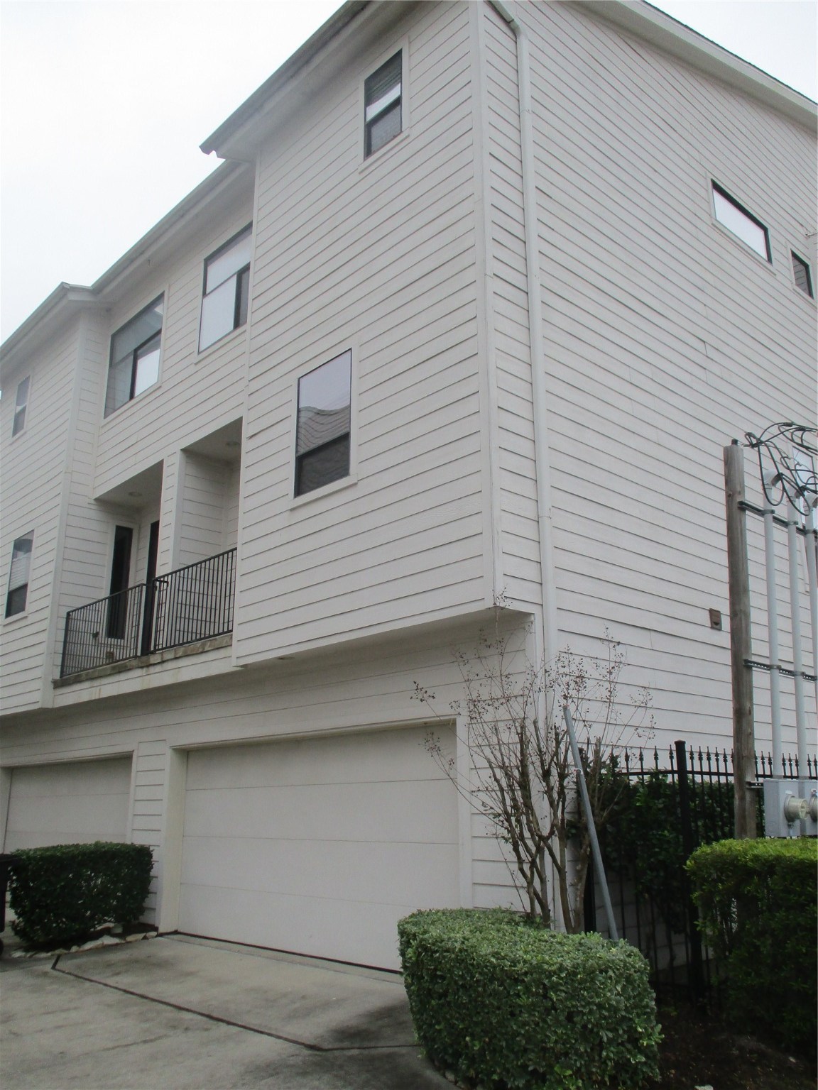 703 St Charles Street Houston, TX 77003 - Photo 2 of 24 a view of a house with a yard