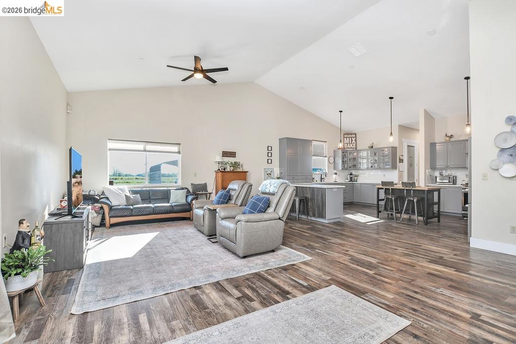 2200 Delta Road Knightsen, CA 94548 - Photo 6 of 26 Living room with ceiling fan, lofted ceiling, and dark wood finished floors