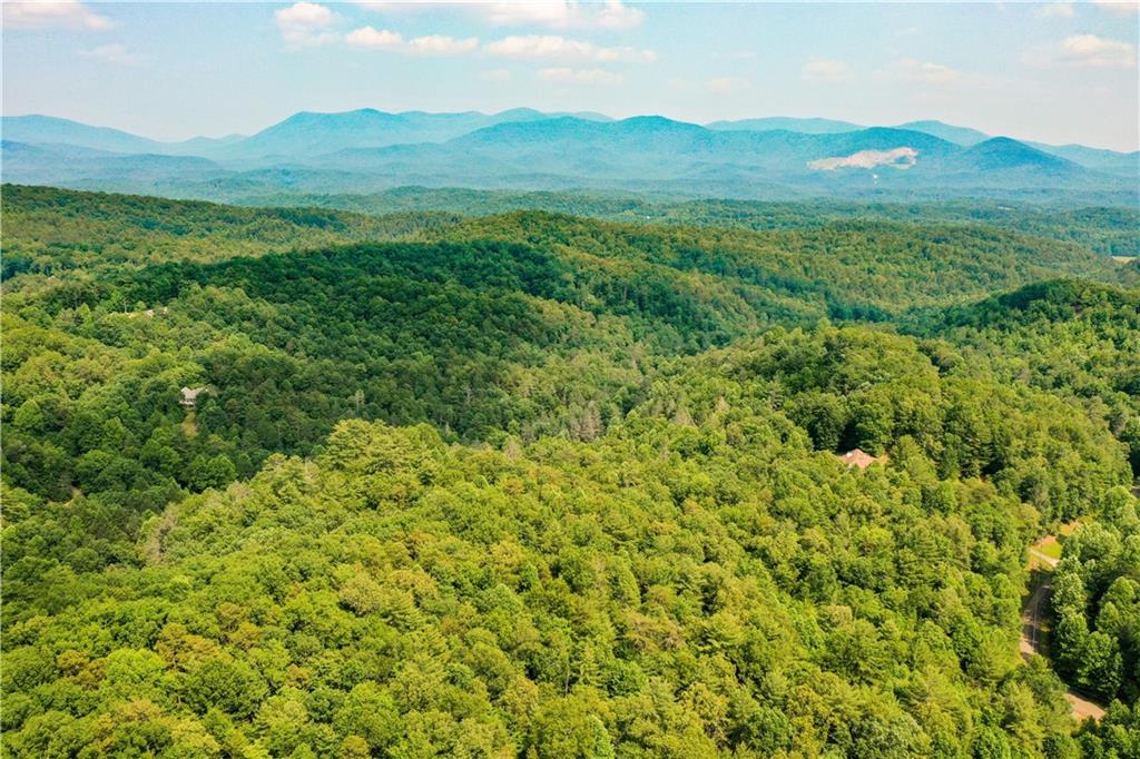 0 Flagpole Circle Ellijay, GA 30540 - Photo 5 of 5 a view of a lush green hillside and mountains