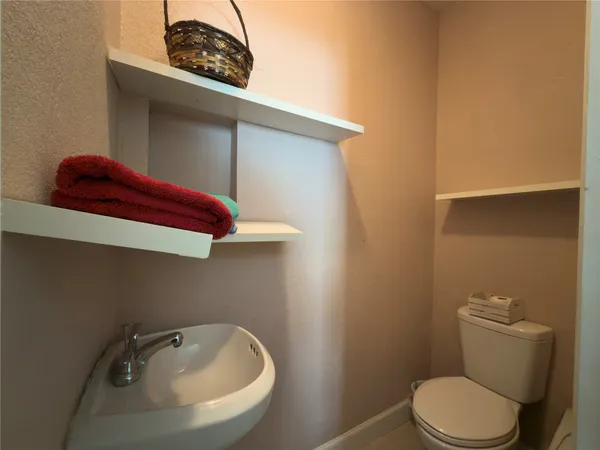 a bathroom with a sink and a toilet