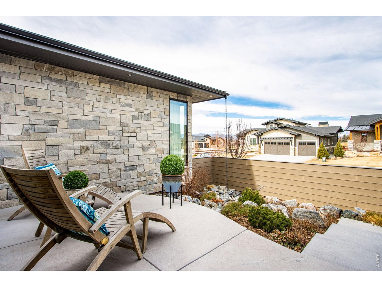 4186 Prestwich Court Timnath, CO 80547 - Photo 14 of 48 a balcony with table and chairs