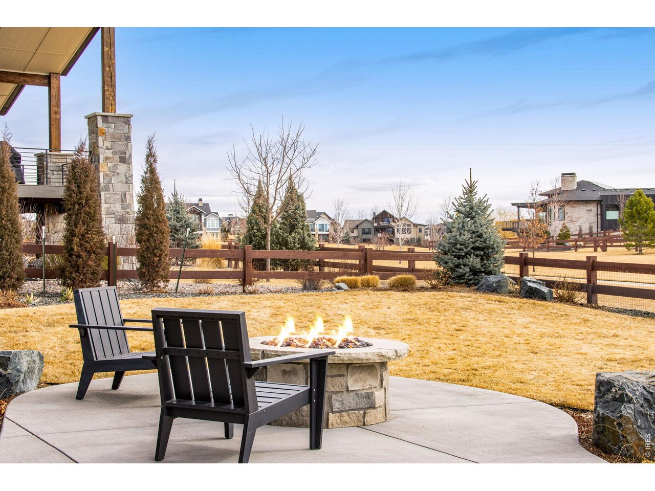 4186 Prestwich Court Timnath, CO 80547 - Photo 18 of 48 a view of a terrace with furniture and city view