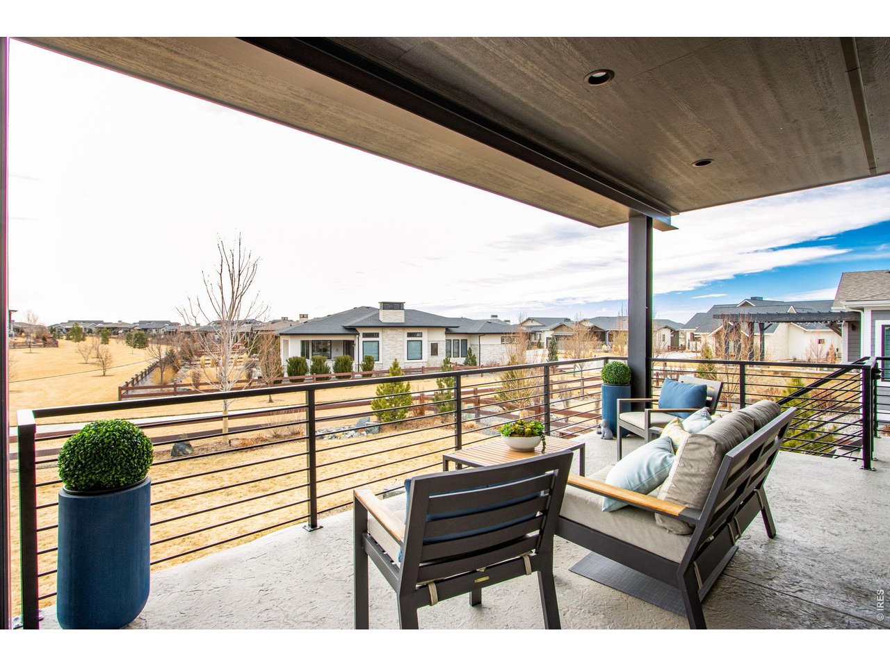 4186 Prestwich Court Timnath, CO 80547 - Photo 20 of 48 a view of a balcony with furniture