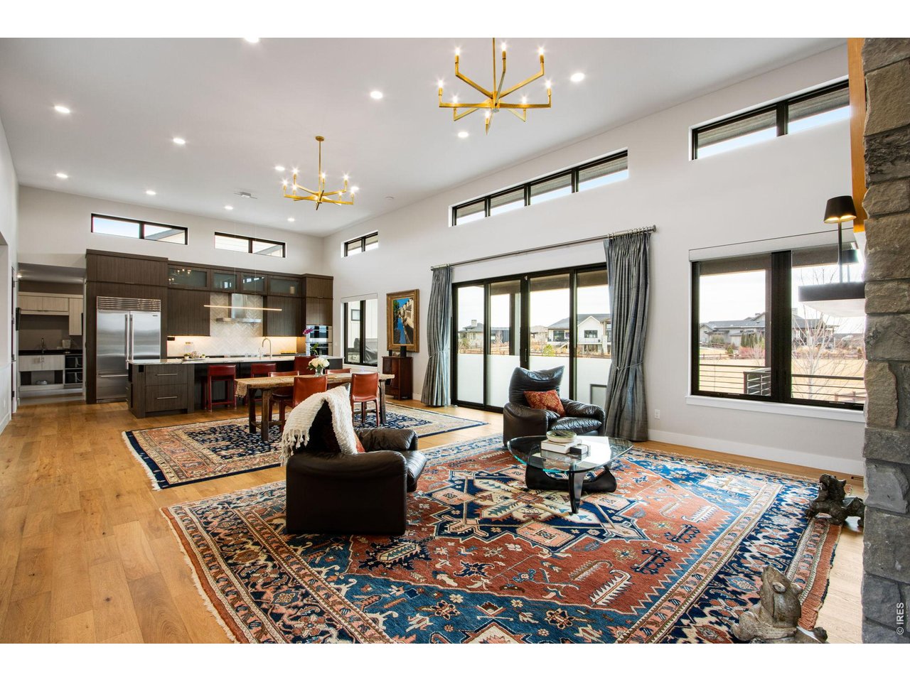 4186 Prestwich Court Timnath, CO 80547 - Photo 28 of 48 a living room with furniture and a large window