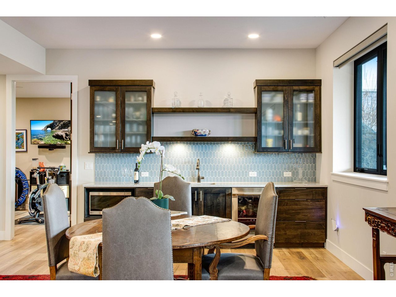 4186 Prestwich Court Timnath, CO 80547 - Photo 46 of 48 a kitchen with a table and chairs