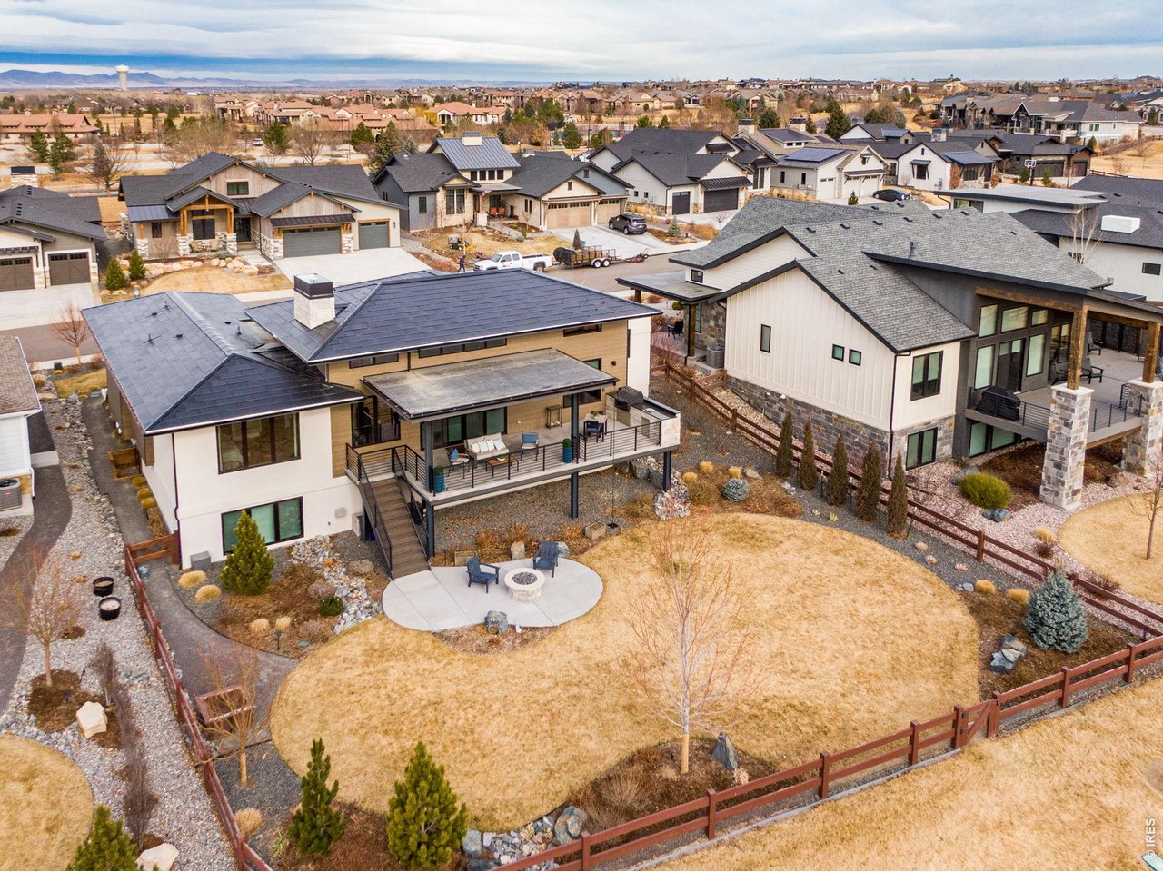 4186 Prestwich Court Timnath, CO 80547 - Photo 5 of 48 a aerial view of a house with swimming pool and patio