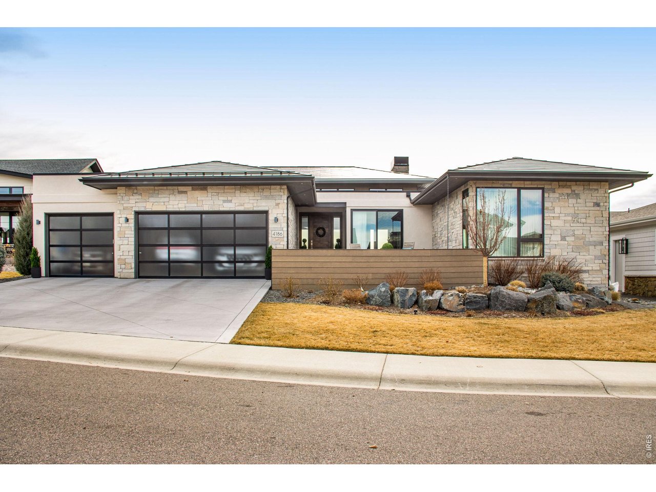 4186 Prestwich Court Timnath, CO 80547 - Photo 10 of 48 a front view of a house with a yard