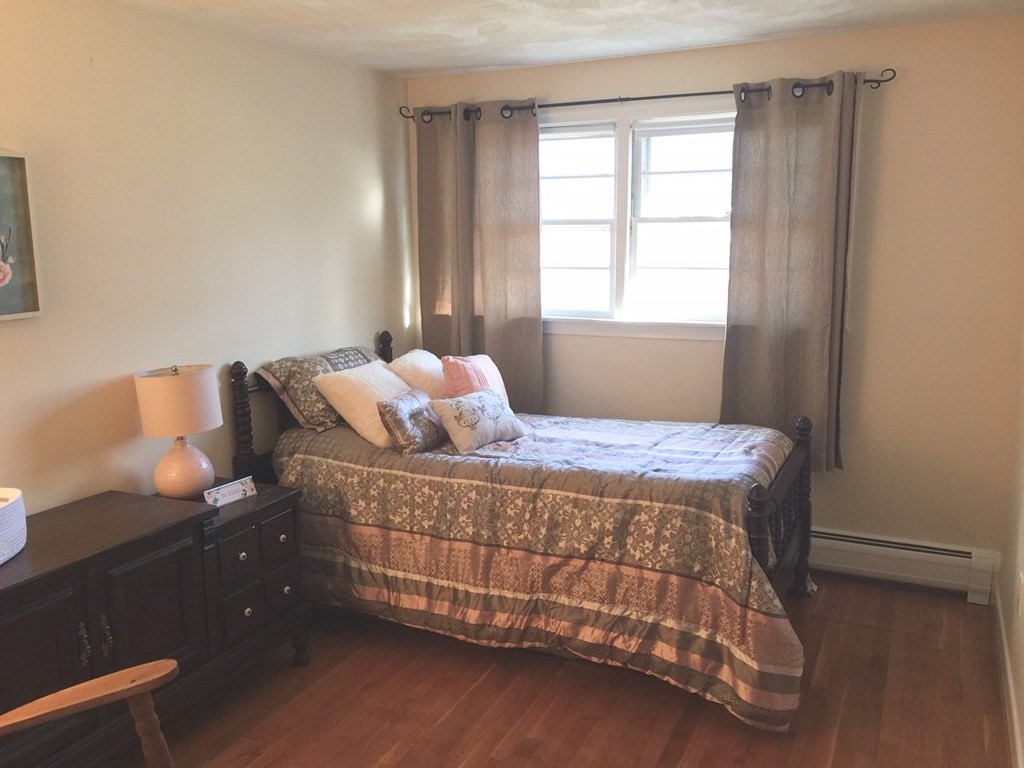 40 Niles Road Randolph, MA 02368 - Photo 19 of 29 a bedroom with a bed and window