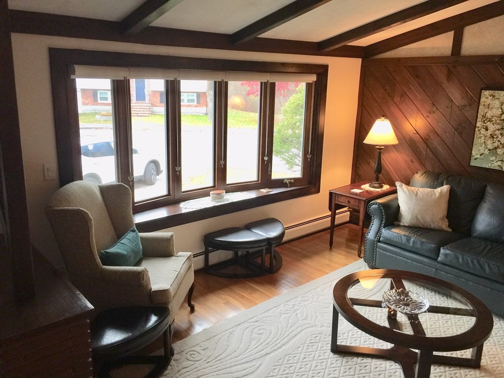 40 Niles Road Randolph, MA 02368 - Photo 4 of 29 a living room with furniture and a large window