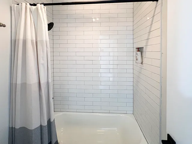 a bathroom with a bathtub