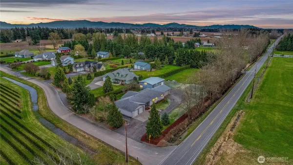 an aerial view of a house with a garden