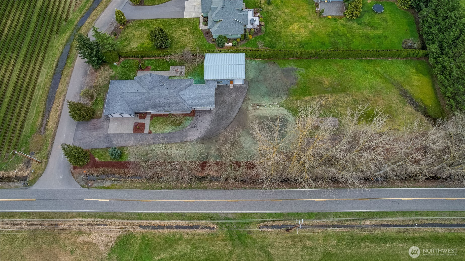 693 Shultz Drive Bellingham, WA 98226 - Photo 31 of 34 an aerial view of a house with a yard basket ball court and outdoor seating