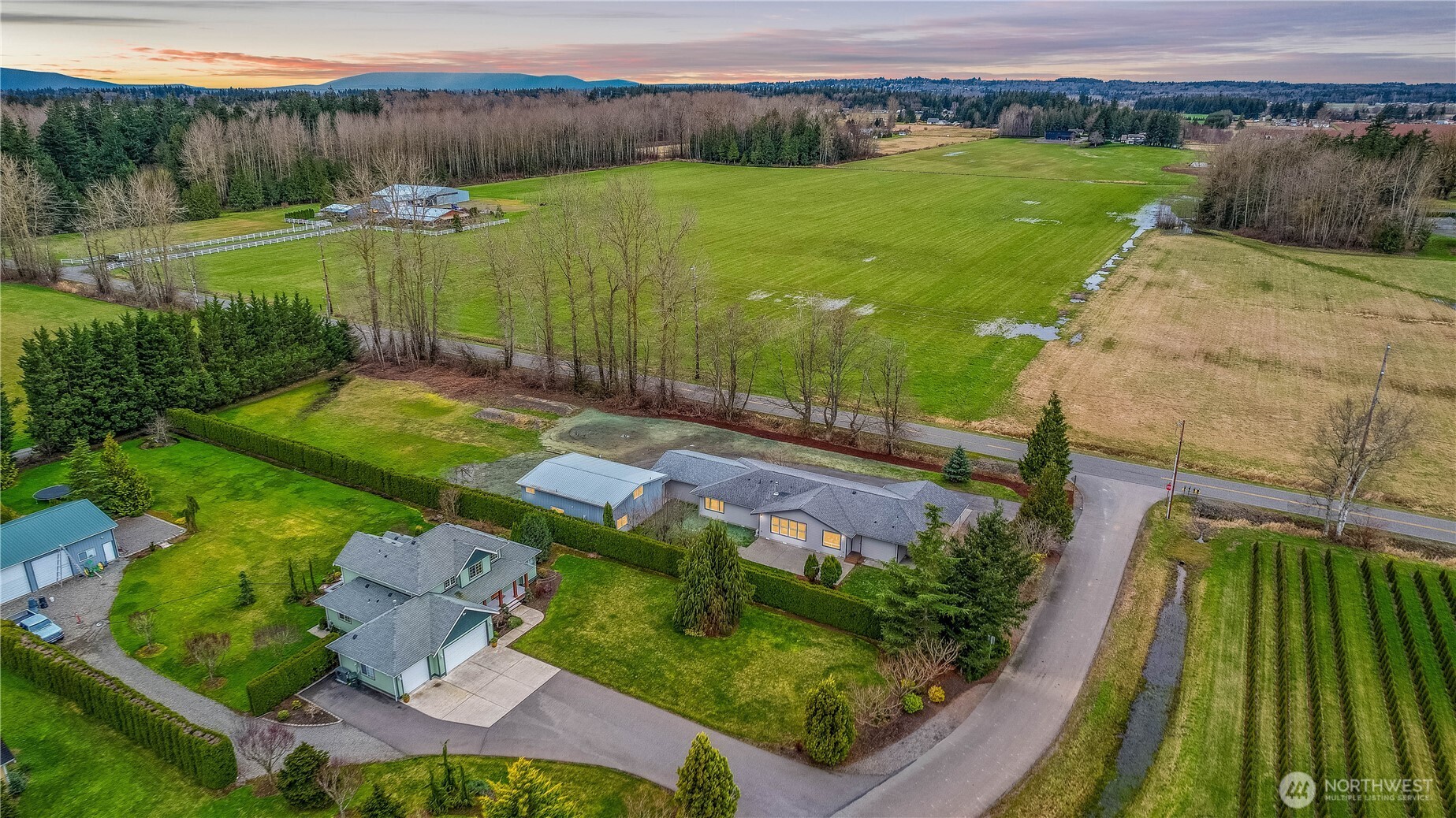 693 Shultz Drive Bellingham, WA 98226 - Photo 32 of 34 a view of a lake with a yard