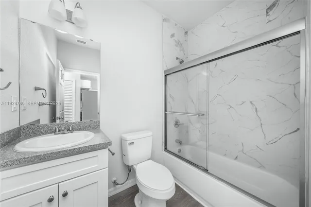 a bathroom with a bath tub and a shower