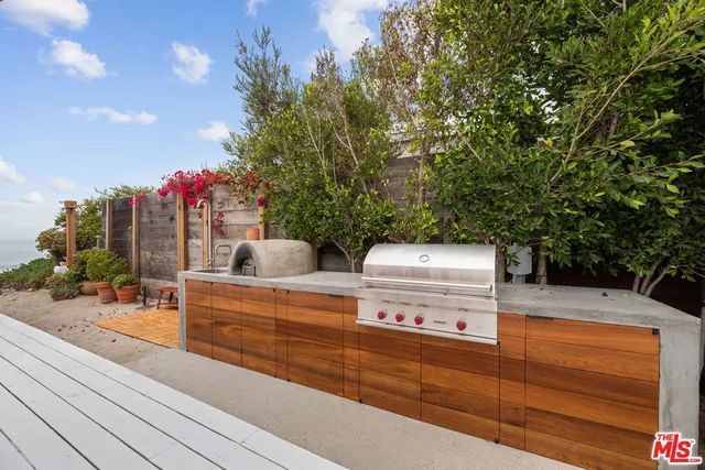 a view of a terrace with sitting area