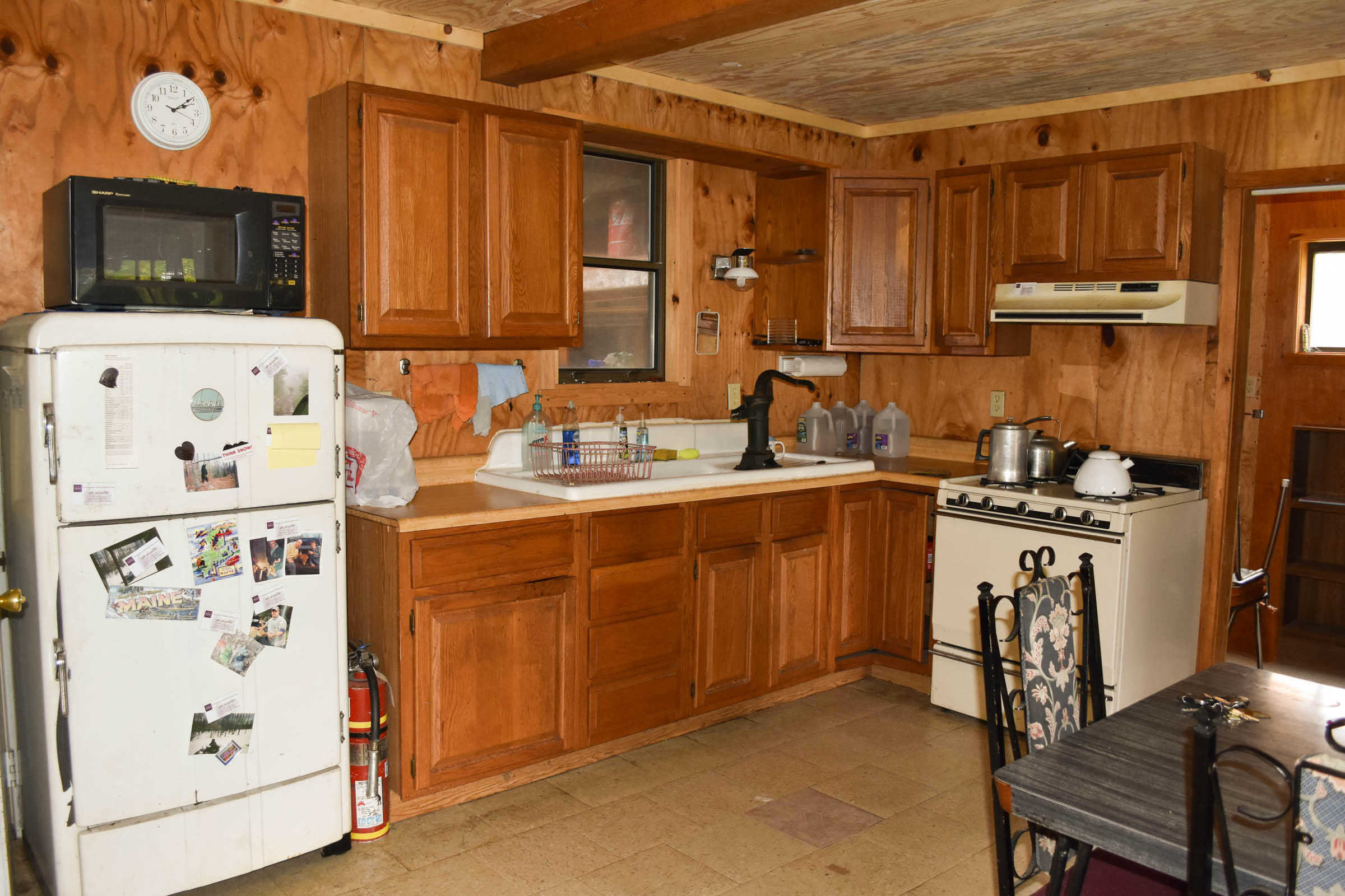 369 Old County Road Garland, ME 04939 - Photo 5 of 24 5. Kitchen, gas range and ice box