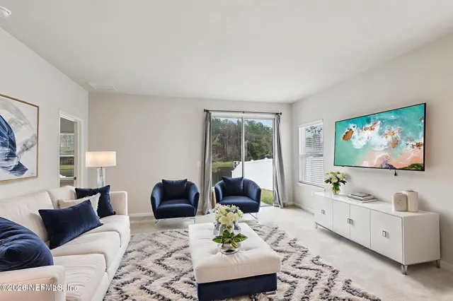 a view of a livingroom with furniture