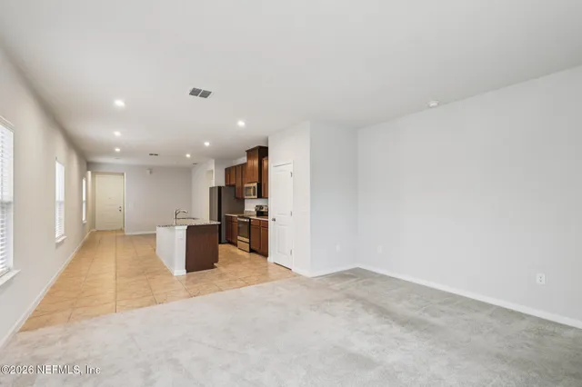 an empty room with windows