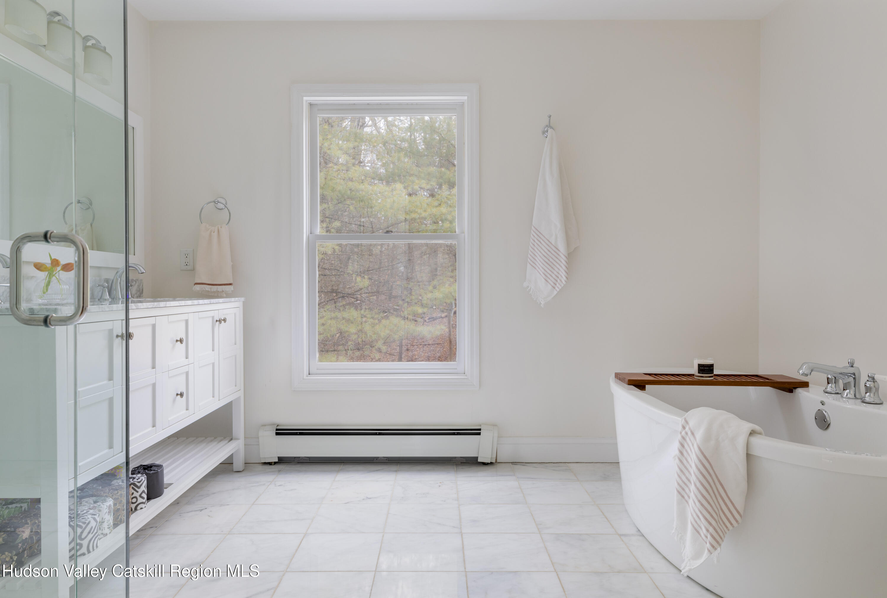 79 Stillwater Road Stone Ridge, NY 12484 - Photo 17 of 29 a view of an empty room with a window