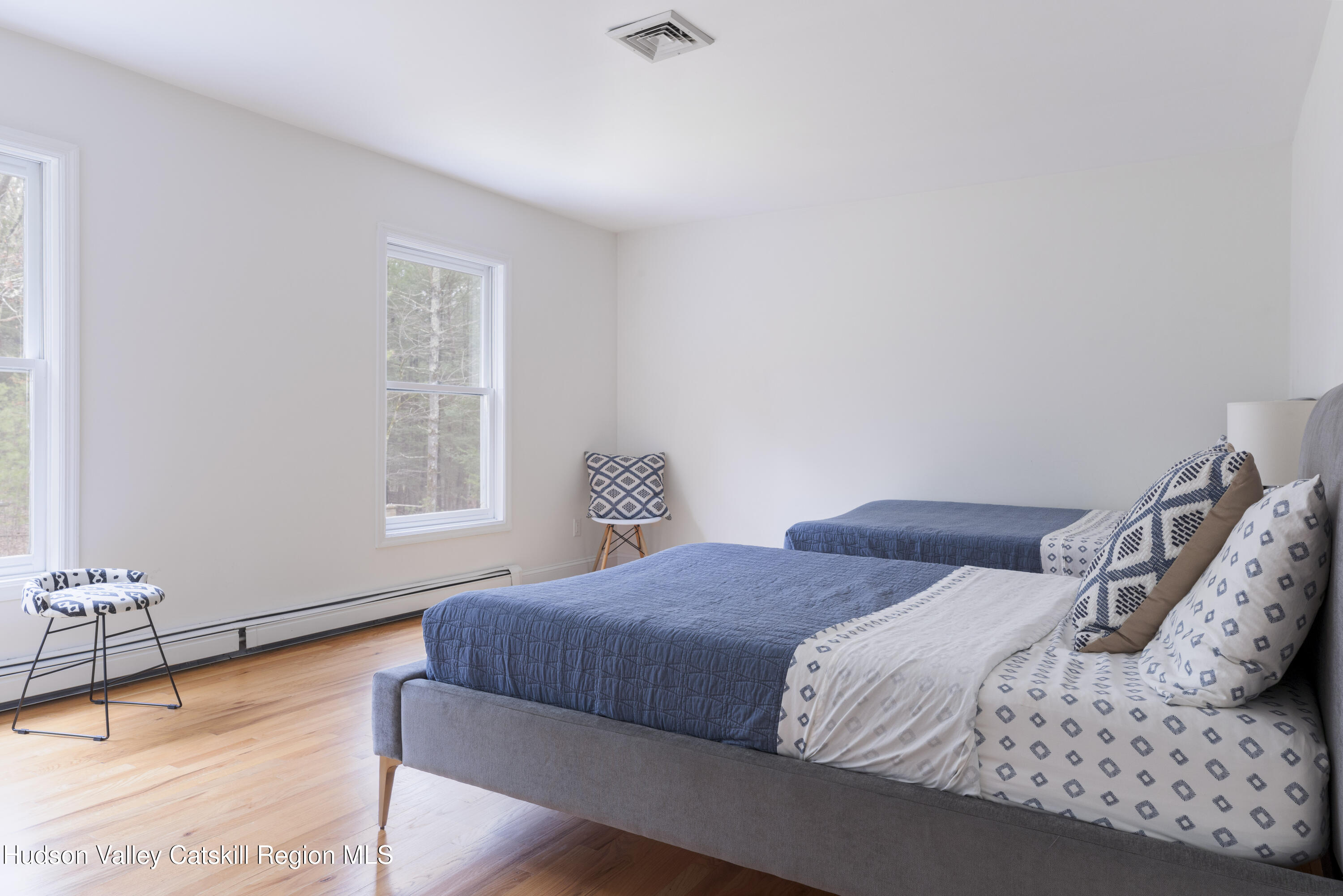 79 Stillwater Road Stone Ridge, NY 12484 - Photo 20 of 29 a bedroom with a bed and window