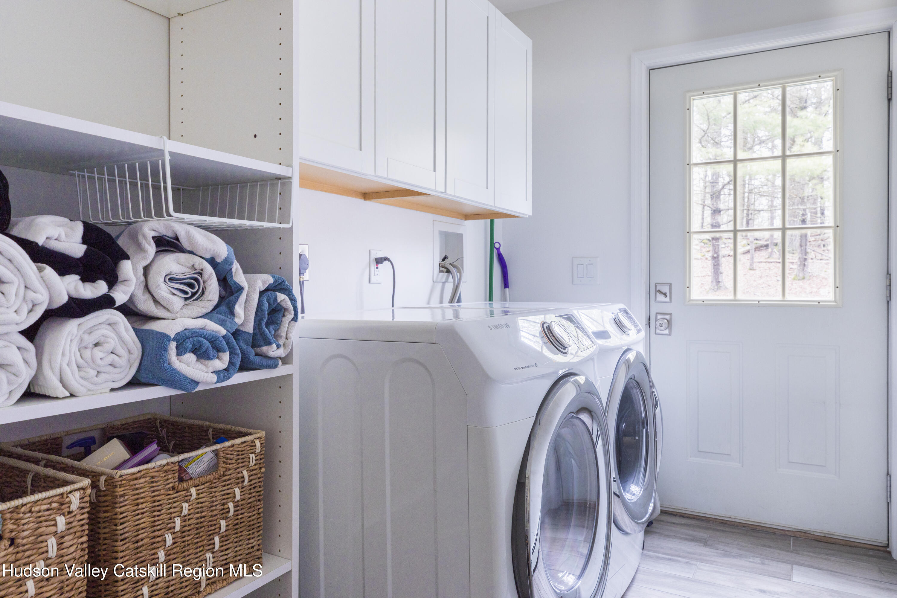 79 Stillwater Road Stone Ridge, NY 12484 - Photo 22 of 29 a utility room with dryer and washer