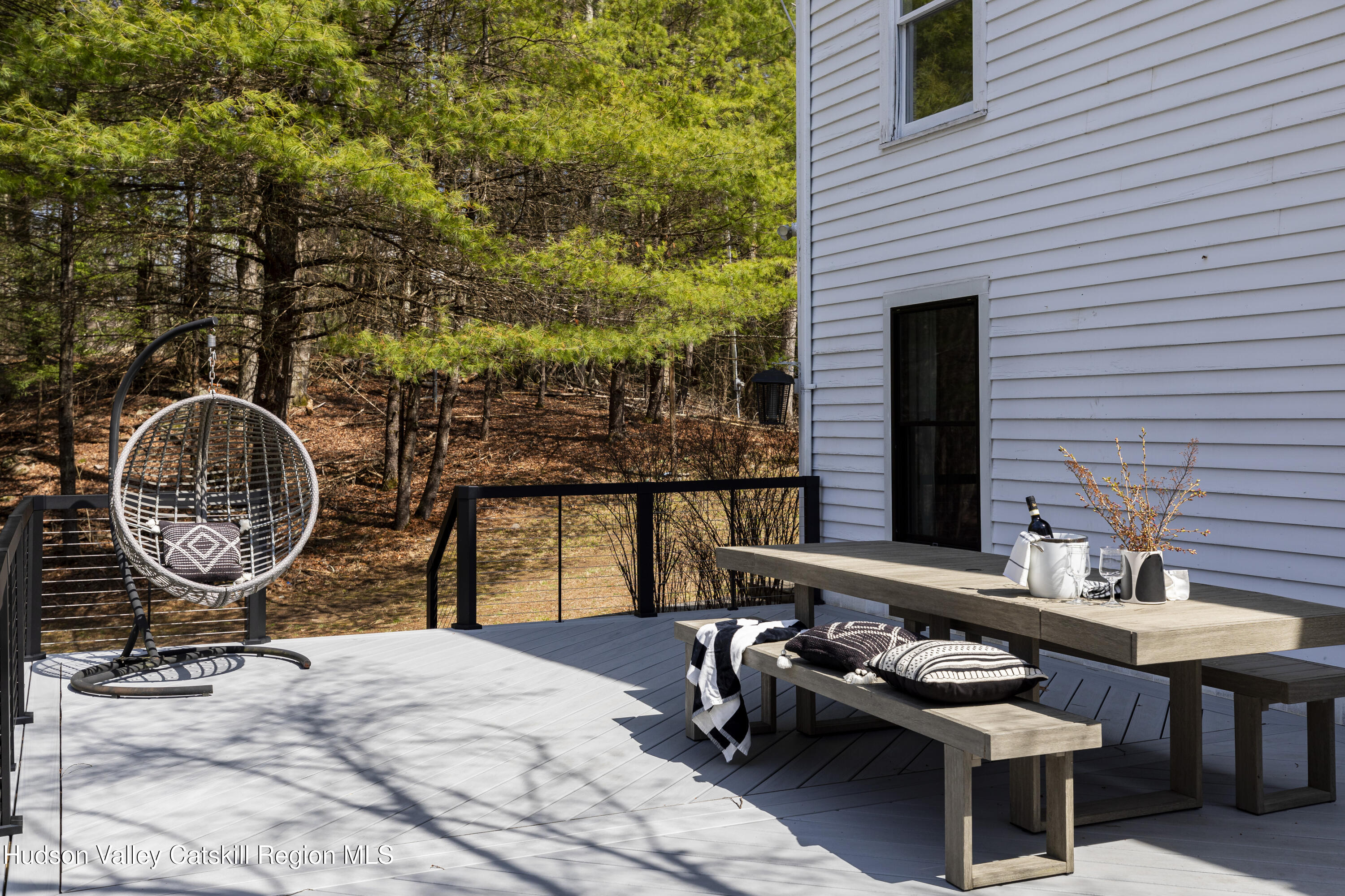79 Stillwater Road Stone Ridge, NY 12484 - Photo 26 of 29 a backyard of a house with barbeque oven and a table