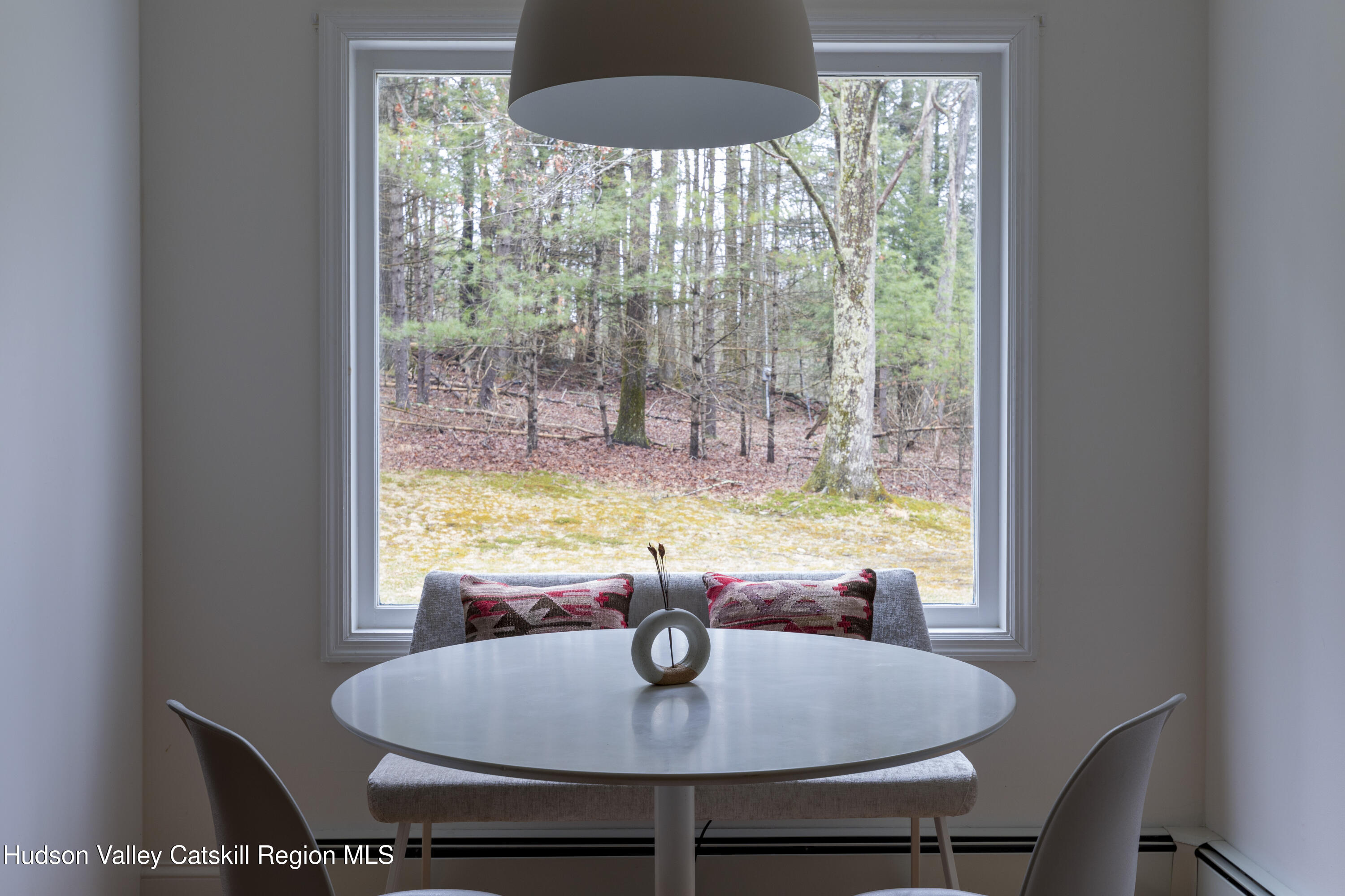 79 Stillwater Road Stone Ridge, NY 12484 - Photo 10 of 29 a view of a dining room with furniture window and outside view