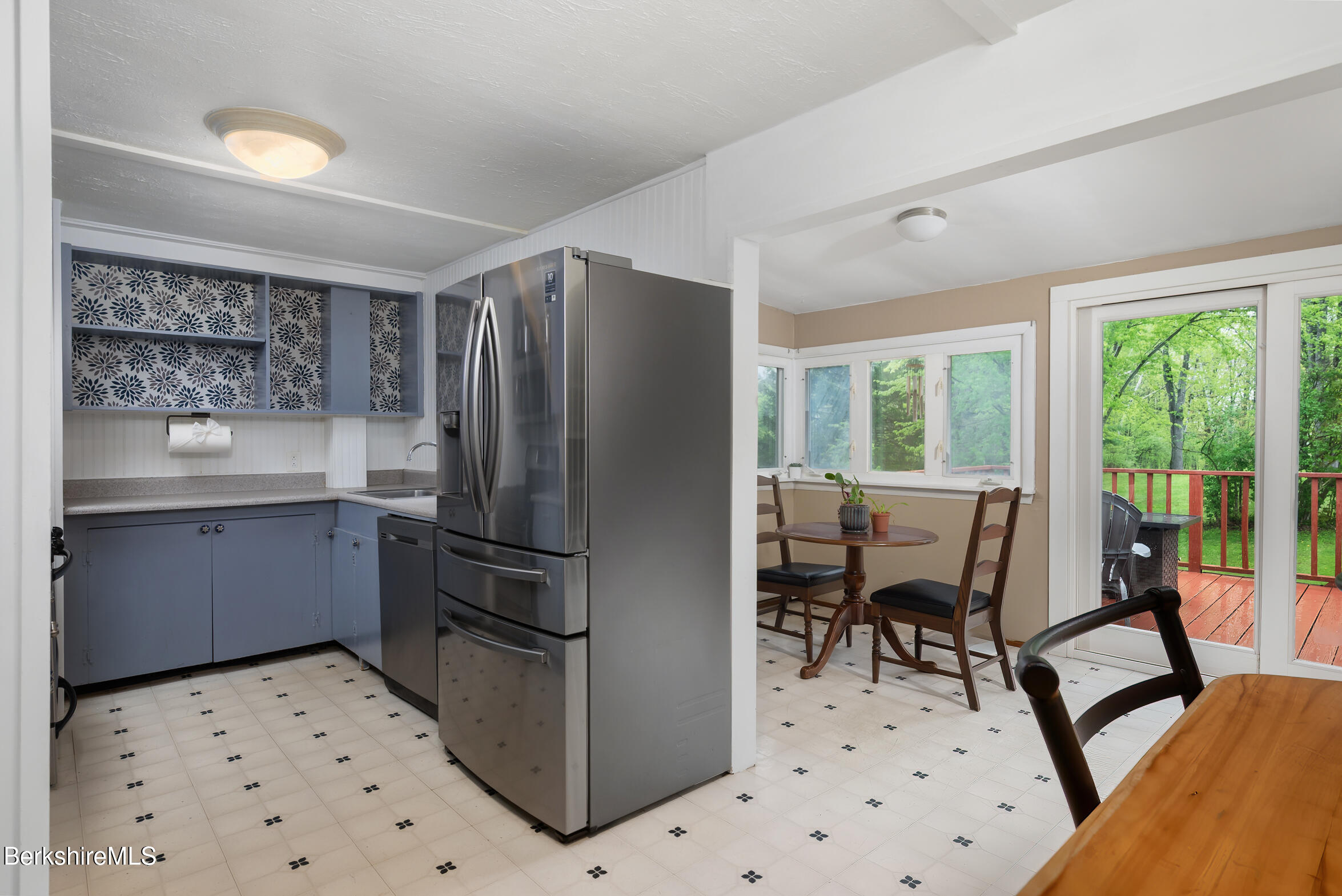 310 Luce Road Williamstown, MA 01267 - Photo 11 of 30 a kitchen with stainless steel appliances a refrigerator and wooden cabinets