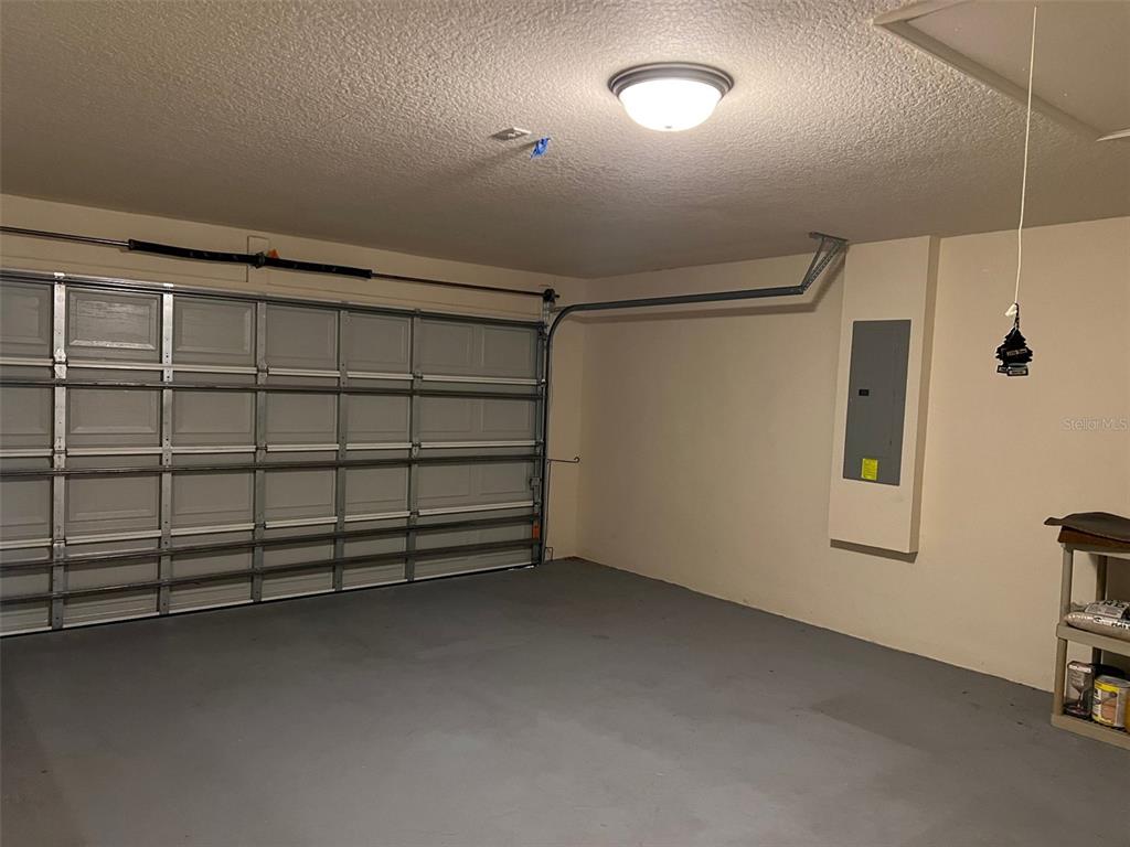 9883 Southwest 55th Ave Road Ocala, FL 34476 - Photo 28 of 30 a view of a garage