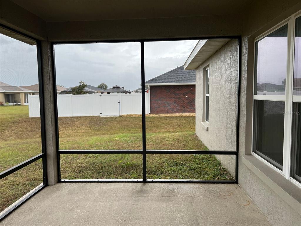9883 Southwest 55th Ave Road Ocala, FL 34476 - Photo 29 of 30 a view of a glass door