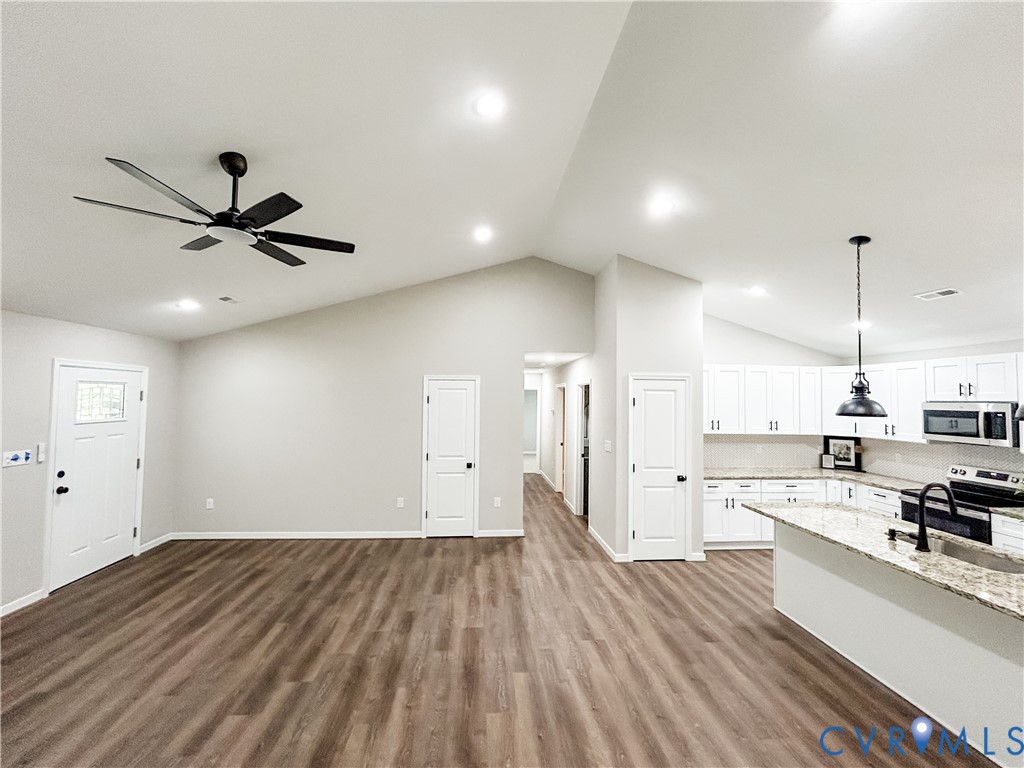 10295 Ashcake Road Ashland, VA 23005 - Photo 17 of 24 Expansive open-concept living area featuring vault
