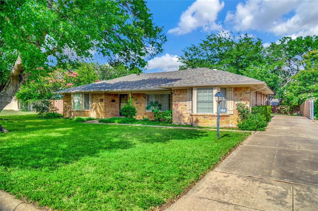 6021 Sycamore Creek Road Edgecliff Village, TX 76134 - Photo 2 of 37 a front view of a house with a yard