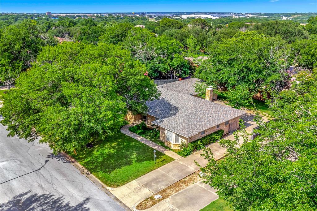 6021 Sycamore Creek Road Edgecliff Village, TX 76134 - Photo 9 of 37 an aerial view of a house with garden space and street view