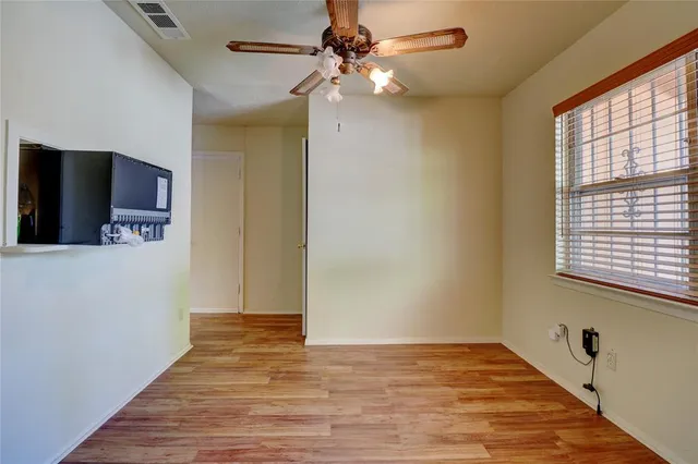a view of a livingroom with a flat screen tv