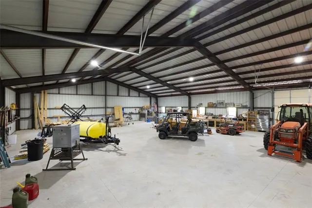 a view of parking garage with cars
