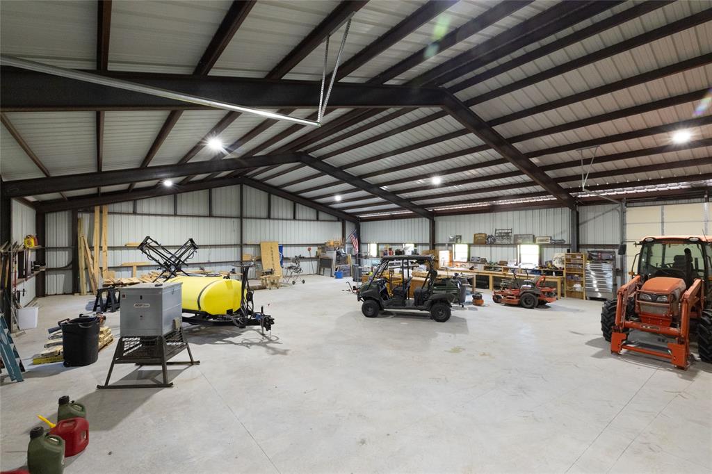 1370 Parker Dairy Road Forestburg, TX 76239 - Photo 18 of 35 a view of parking garage with cars