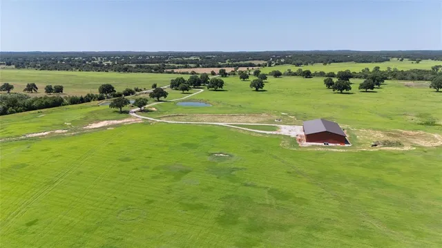 a view of a golf course with a swimming pool