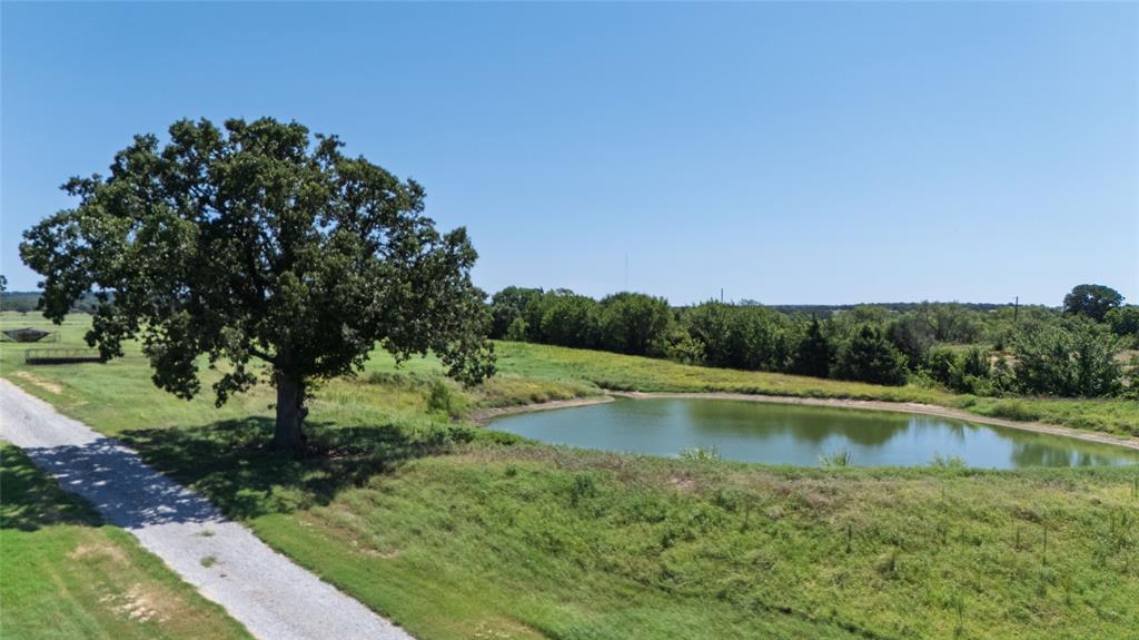 1370 Parker Dairy Road Forestburg, TX 76239 - Photo 3 of 35 a view of a swimming pool with a yard