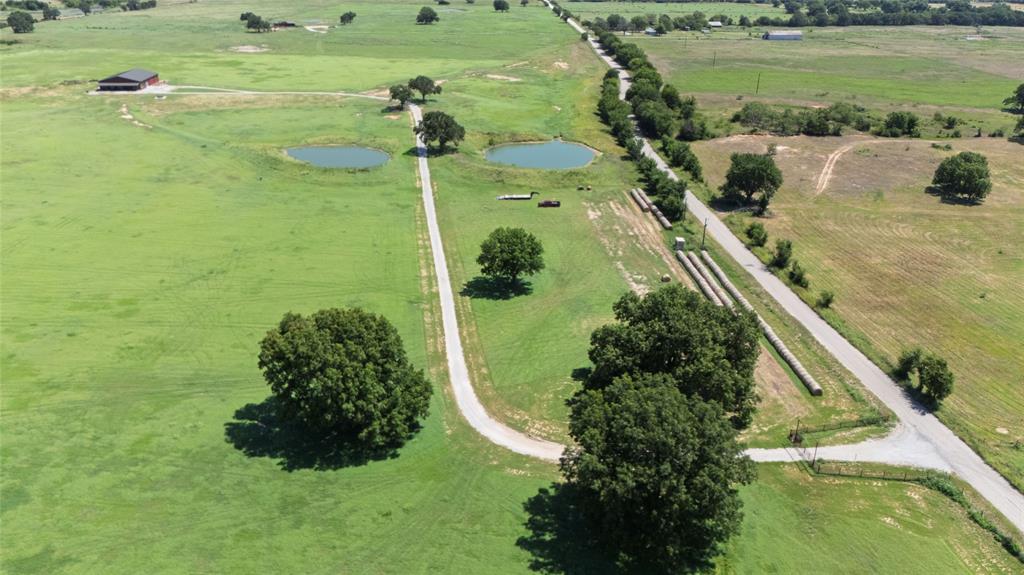 1370 Parker Dairy Road Forestburg, TX 76239 - Photo 31 of 35 a view of a lake with a yard