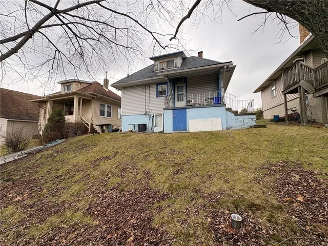a car parked in front of a house