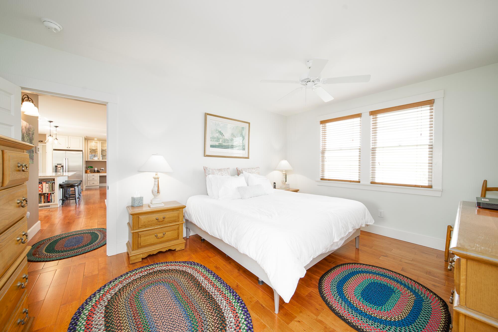 27 Watcha Path Edgartown, MA 02539 - Photo 12 of 24 a bedroom with a bed and a dresser next to a window
