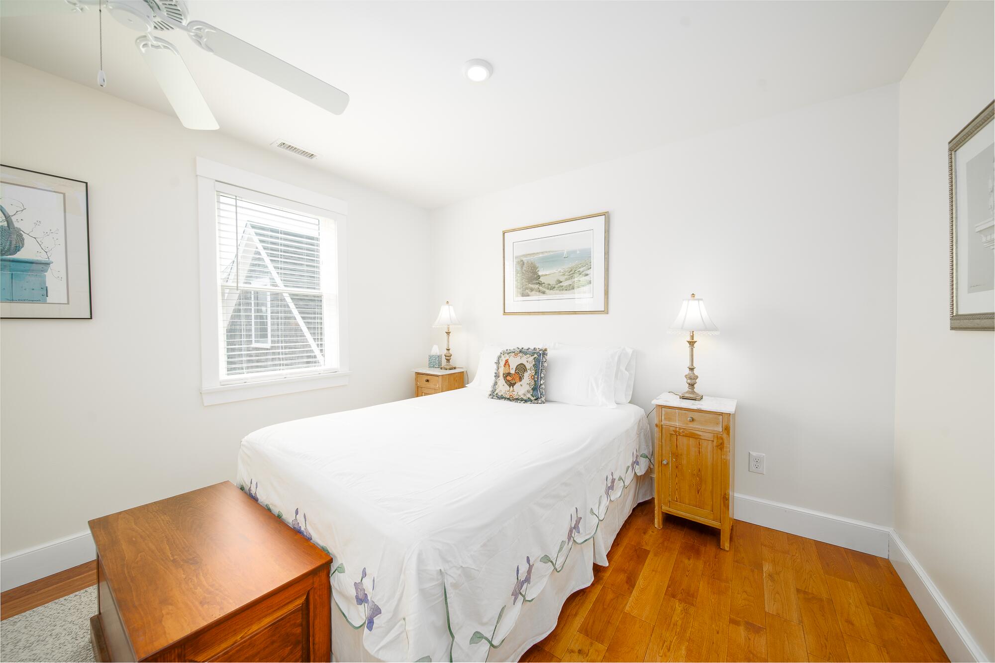 27 Watcha Path Edgartown, MA 02539 - Photo 14 of 24 a bed room with a bed