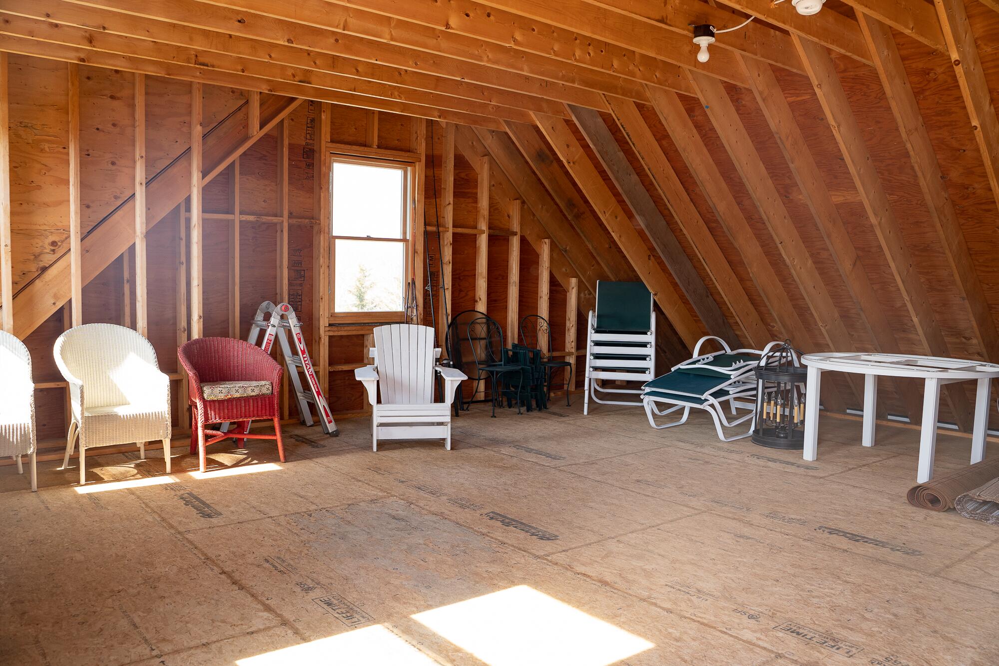 27 Watcha Path Edgartown, MA 02539 - Photo 23 of 24 a view of a chairs and table in the back yard of the house