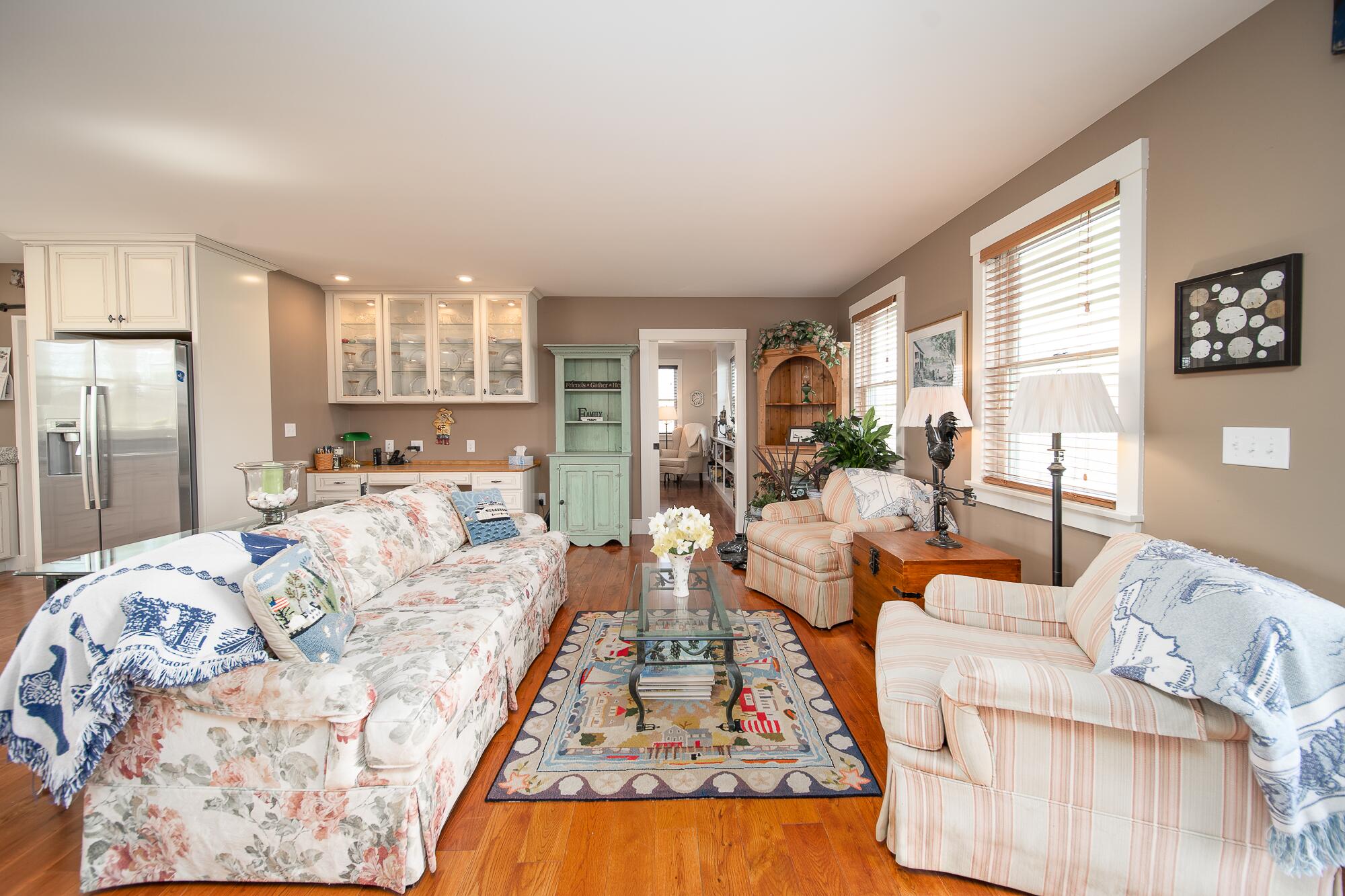 27 Watcha Path Edgartown, MA 02539 - Photo 6 of 24 a view of a living room kitchen and a large window